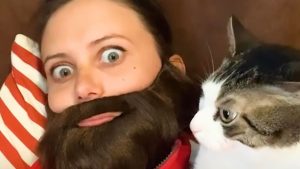 This woman started wearing a fake beard to trick her cat into liking her